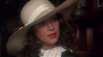 Movie still from “Cabaret” (1972), directed by Bob Fosse – A person wearing a hat; Close Up shot, High angle