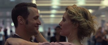 Movie still from “Café de Flore” (2011), directed by Jean-Marc Vallée – A man and a woman looking at one another; Close Up shot, Over the shoulder angle