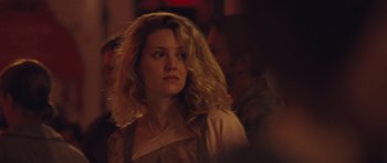 Movie still from “Café de Flore” (2011), directed by Jean-Marc Vallée – A person with curly hair; Close Up shot, Over the shoulder angle