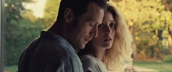 Movie still from “Café de Flore” (2011), directed by Jean-Marc Vallée – A man and a woman standing next to each other; Close Up shot, Low angle