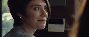 Movie still from “Café de Flore” (2011), directed by Jean-Marc Vallée – A woman's face in front of a camera; Close Up shot, Over the shoulder angle