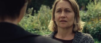 Movie still from “Café de Flore” (2011), directed by Jean-Marc Vallée – A person looking at the camera; Close Up shot, Over the shoulder angle