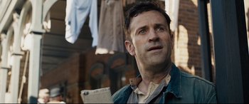 Movie still from “The Call of the Wild” (2020), directed by Chris Sanders – A person wearing a jacket; Close Up shot, Over the shoulder angle