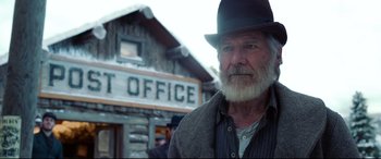 Movie still from “The Call of the Wild” (2020), directed by Chris Sanders – An old man with a beard wearing a black hat; Close Up shot, Low angle