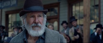 Movie still from “The Call of the Wild” (2020), directed by Chris Sanders – An old man with a beard wearing a hat; Close Up shot, Over the shoulder angle