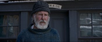 Movie still from “The Call of the Wild” (2020), directed by Chris Sanders – An old man with a gray beard wearing a hat; Close Up shot, Over the shoulder angle