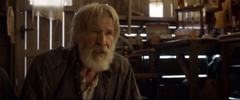 Movie still from “The Call of the Wild” (2020), directed by Chris Sanders – An old man with a beard and white hair; Close Up shot, Over the shoulder angle
