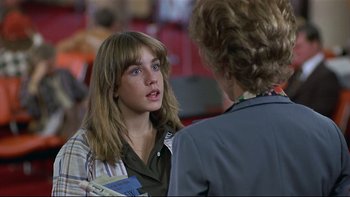 Movie still from “California Suite” (1978), directed by Herbert Ross – A young woman talking to a woman in a business suit; Close Up shot, Over the shoulder angle