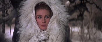 Movie still from “Camelot” (1967), directed by Joshua Logan – A person wearing a white coat; Close Up shot, Low angle