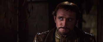 Movie still from “Camelot” (1967), directed by Joshua Logan – A person with a beard; Close Up shot, Over the shoulder angle