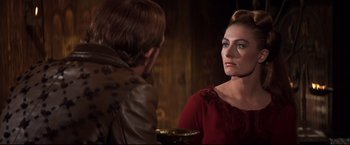 Movie still from “Camelot” (1967), directed by Joshua Logan – A man and a woman are looking at one another; Close Up shot, Over the shoulder angle