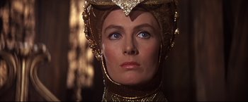 Movie still from “Camelot” (1967), directed by Joshua Logan – A person wearing a costume; Close Up shot, Low angle
