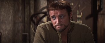 Movie still from “Camelot” (1967), directed by Joshua Logan – A person with a beard; Close Up shot, Over the shoulder angle