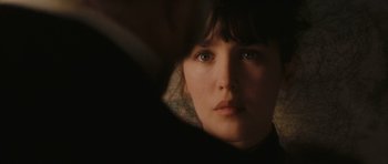 A woman's face in the dark