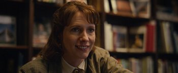 Movie still from “Can You Ever Forgive Me?” (2018), directed by Marielle Heller – A person wearing a suit and tie; Close Up shot, Over the shoulder angle