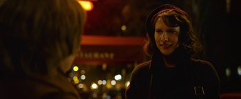 Movie still from “Can You Ever Forgive Me?” (2018), directed by Marielle Heller – A woman wearing a hat is talking to a man; Close Up shot, Over the shoulder angle