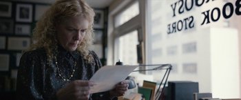 Movie still from “Can You Ever Forgive Me?” (2018), directed by Marielle Heller – A woman is reading a piece of paper; Close Up shot, Over the shoulder angle
