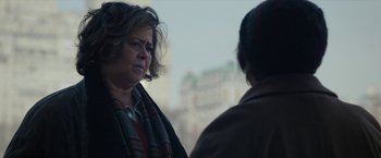 Movie still from “Can You Ever Forgive Me?” (2018), directed by Marielle Heller – A woman wearing a scarf talking to another woman; Close Up shot, Over the shoulder angle
