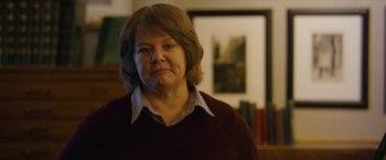 Movie still from “Can You Ever Forgive Me?” (2018), directed by Marielle Heller – A person wearing a sweater; Close Up shot, Over the shoulder angle