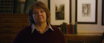 Movie still from “Can You Ever Forgive Me?” (2018), directed by Marielle Heller – A person wearing a sweater; Close Up shot, Over the shoulder angle