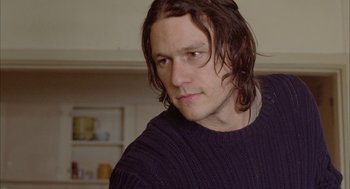 Movie still from “Candy” (2006), directed by Neil Armfield – A person with long hair; Close Up shot, Over the shoulder angle