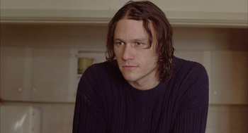 Movie still from “Candy” (2006), directed by Neil Armfield – A person with long hair; Close Up shot, Over the shoulder angle