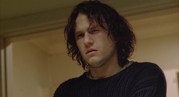 Movie still from “Candy” (2006), directed by Neil Armfield – A person with long hair; Close Up shot, Low angle