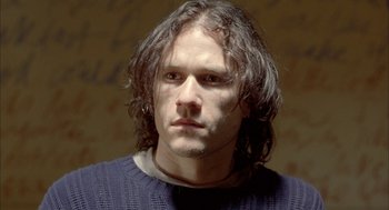 Movie still from “Candy” (2006), directed by Neil Armfield – A person with long hair; Close Up shot, High angle