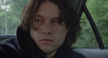 Movie still from “Candy” (2006), directed by Neil Armfield – A person with long hair; Close Up shot, Low angle