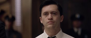 Movie still from “Capote” (2005), directed by Bennett Miller – A person wearing a shirt and a tie; Close Up shot, Low angle