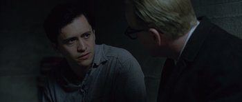 Movie still from “Capote” (2005), directed by Bennett Miller – A man and a woman are talking to each other; Close Up shot, Over the shoulder angle