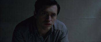 Movie still from “Capote” (2005), directed by Bennett Miller – A person sitting down; Close Up shot, High angle
