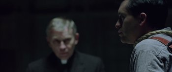 Movie still from “Capote” (2005), directed by Bennett Miller – A man and a woman in a dark room; Close Up shot, Over the shoulder angle