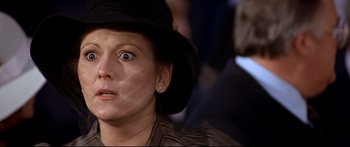 Movie still from “Capricorn One” (1977), directed by Peter Hyams – A person wearing a hat; Close Up shot, Low angle