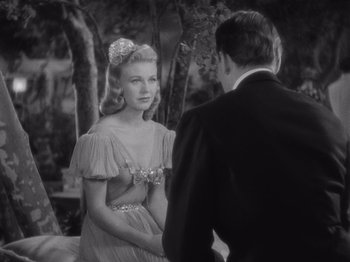 Movie still from “Carefree” (1938), directed by Mark Sandrich – A man and a woman are talking to each other; Close Up shot, Over the shoulder angle