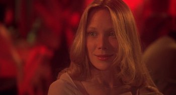 Movie still from “Carrie” (1976), directed by Brian De Palma – A person with long blonde hair; Close Up shot, Low angle