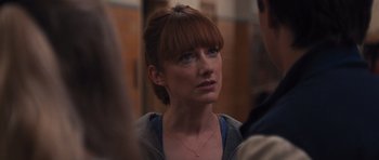 Movie still from “Carrie” (2013), directed by Kimberly Peirce – A person wearing a necklace; Close Up shot, Over the shoulder angle