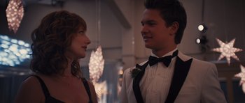 Movie still from “Carrie” (2013), directed by Kimberly Peirce – A man and a woman standing next to each other in formal wear; Close Up shot, Over the shoulder angle
