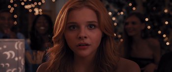 Movie still from “Carrie” (2013), directed by Kimberly Peirce – A person with long hair; Close Up shot, Over the shoulder angle