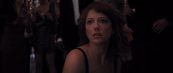 Movie still from “Carrie” (2013), directed by Kimberly Peirce – A person with long red hair; Close Up shot, Over the shoulder angle