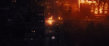Movie still from “Carrie” (2013), directed by Kimberly Peirce – An aerial view of a city street at night; Extreme Wide shot, High angle