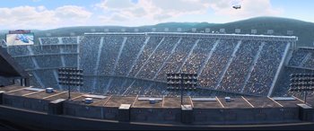 Movie still from “Cars 3” (2017), directed by Brian Fee – An image of a stadium with a lot of people in it; Extreme Wide shot, High angle