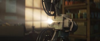 Movie still from “Cars 3” (2017), directed by Brian Fee – A projector with a light shining on it; Extreme Close Up shot, Low angle