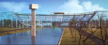 Movie still from “Cars 3” (2017), directed by Brian Fee – An empty swimming pool in front of a large stadium; Extreme Wide shot, High angle