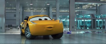 Movie still from “Cars 3” (2017), directed by Brian Fee – A car in a room; Wide shot, Low angle