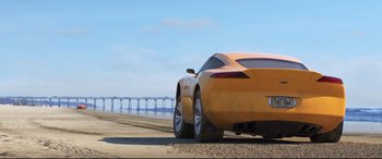 Movie still from “Cars 3” (2017), directed by Brian Fee – An orange sports car parked on the side of the road; Wide shot, Low angle