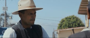Movie still from “Cartel Land” (2015), directed by Matthew Heineman – A person wearing a hat; Close Up shot, Low angle