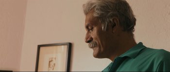 Movie still from “Cartel Land” (2015), directed by Matthew Heineman – An older man with white hair and a mustache looking to his left; Close Up shot, Low angle