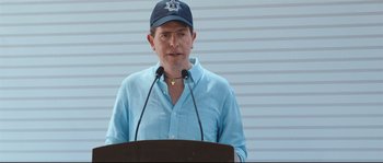 Movie still from “Cartel Land” (2015), directed by Matthew Heineman – A man in a blue shirt and a blue hat is speaking; Close Up shot, Over the shoulder angle