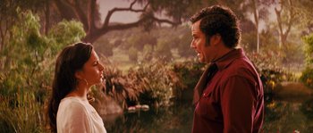 Movie still from “Casa de mi Padre” (2012), directed by Matt Piedmont – A man and a woman standing next to each other near a pond; Medium shot, Over the shoulder angle